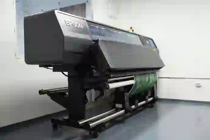 High-speed commercial printing press running a large print job kolkata