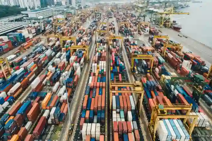 aerial photo of cargo crates near river port kolkata haldia dock