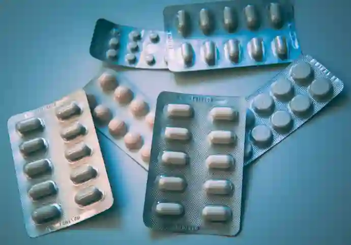 white and blue medical tablets blister pack